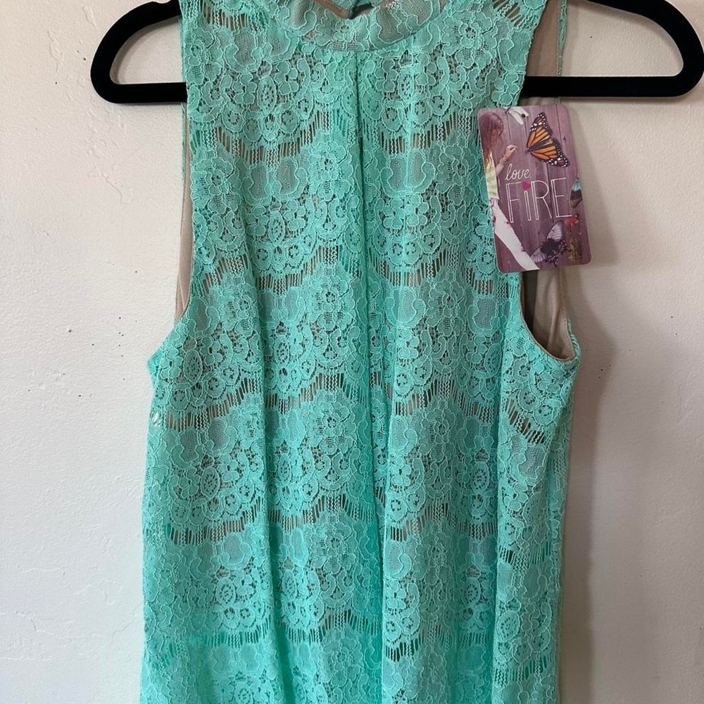 NWT brand new Love Fire teal lace blouse with floral design Sleeveless